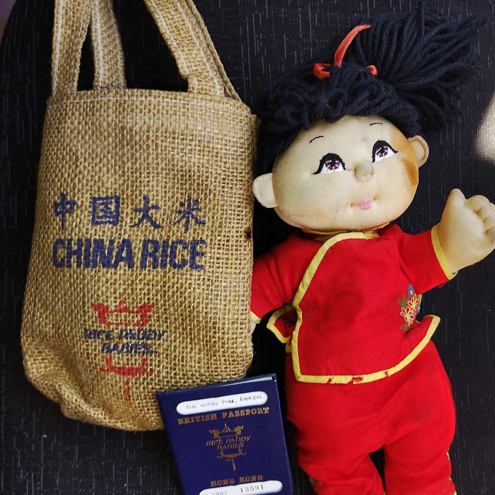 Charming Red Doll with Black Hair